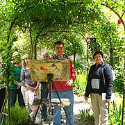 Painting in the shade of the rose garden away from the Tuscan sun