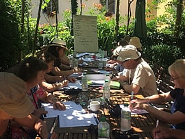 Learning Italian In the garden shade at the watermill in Italy